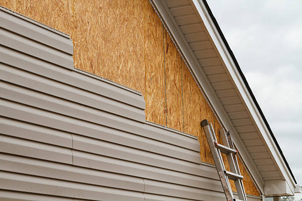 Professional Storm Damage Siding Repair technician working in Frederick, CO